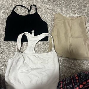 Black, White, and Beige Tank Tops